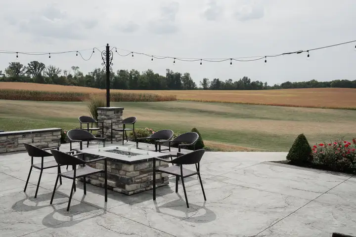 Stamped concrete with an ashlar slate pattern and earth-tone color in Cedar Hill, TX